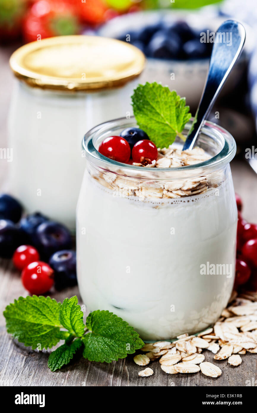 Healthy breakfast - yogurt with muesli and berries - health and diet concept Stock Photo
