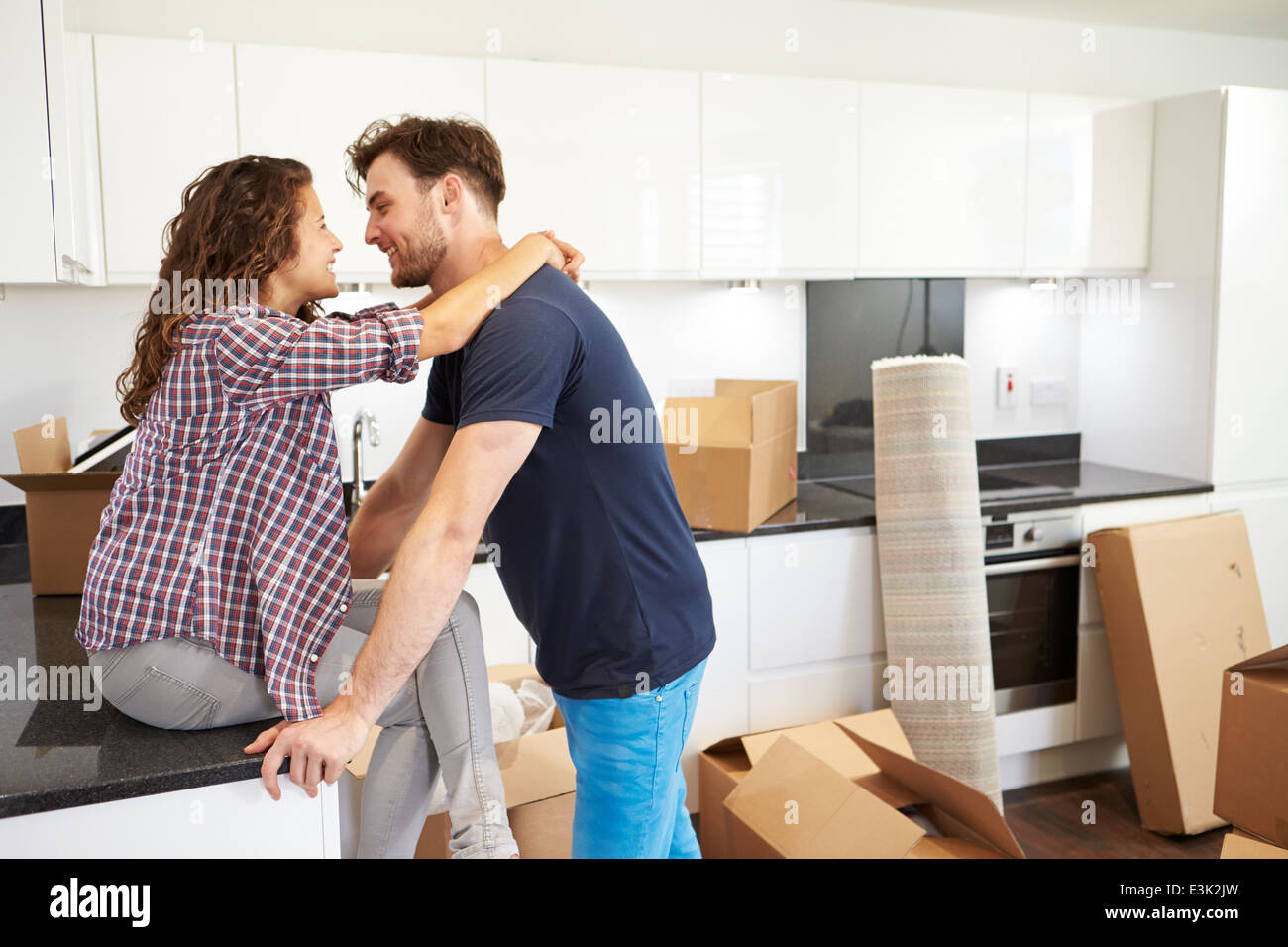 Couple Taking A Break During House Move Stock Photo