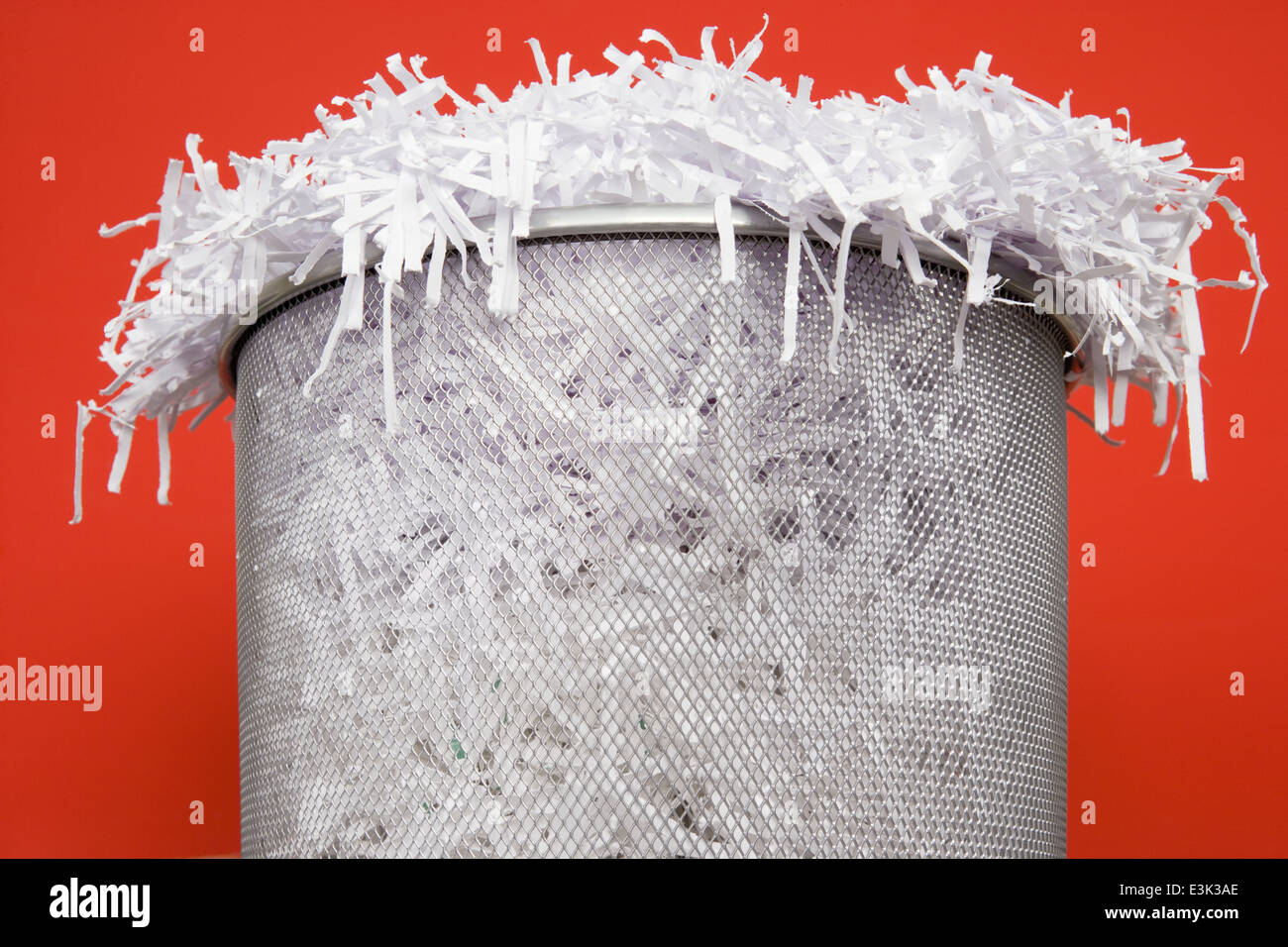 Bin Overflowing with Shredded Paper Stock Photo Alamy