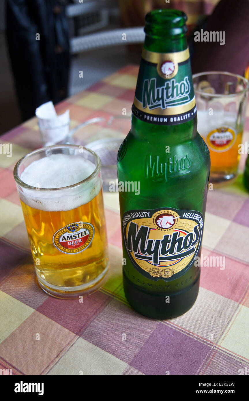 A glass of Mythos Greek beer on a bar on Kos, Greece Stock Photo