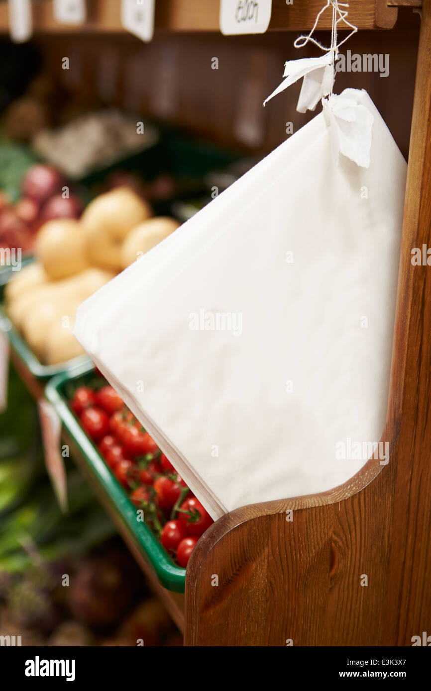 Paper Bags By Fruit Counter Of Farm Shop Stock Photo