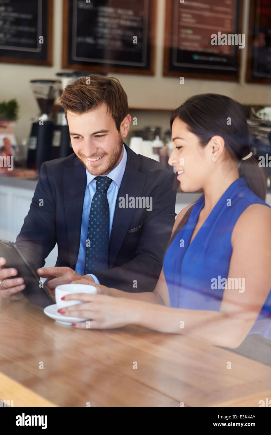 Businessman And Businesswoman Meeting In Coffee Shop Stock Photo - Alamy