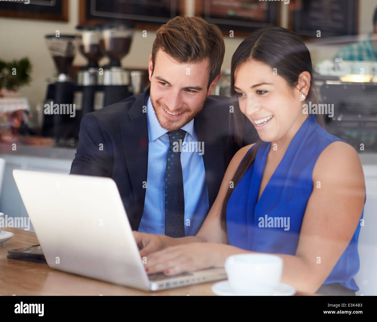 Businessman And Businesswoman Meeting In Coffee Shop Stock Photo - Alamy