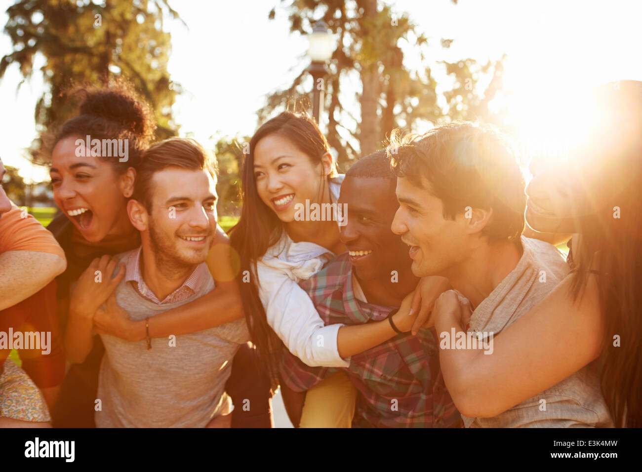 Group Of Friends Having Fun Together Outdoors Stock Photo