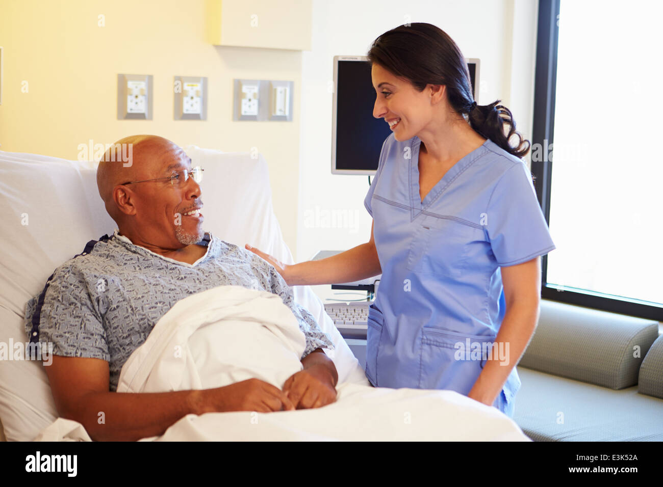 Black male patient nurse hi-res stock photography and images - Alamy