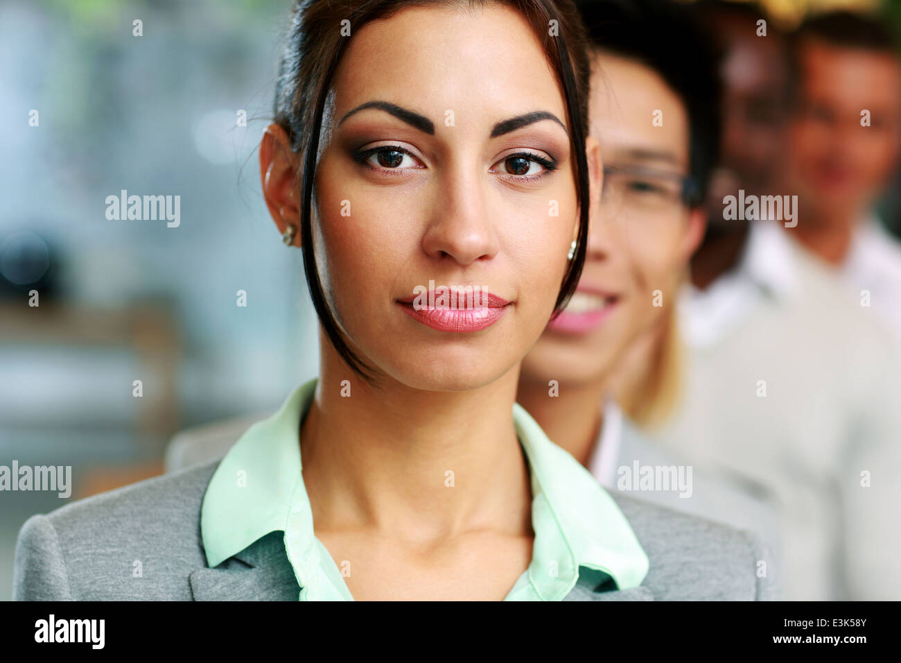 Group of business people in the office lined up Stock Photo - Alamy