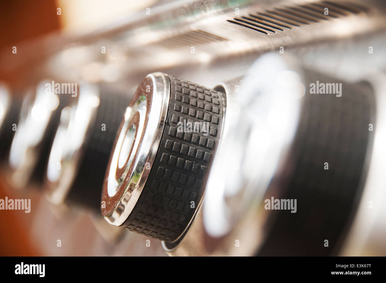 Shiney metal control knobs on a gas barbeque Stock Photo