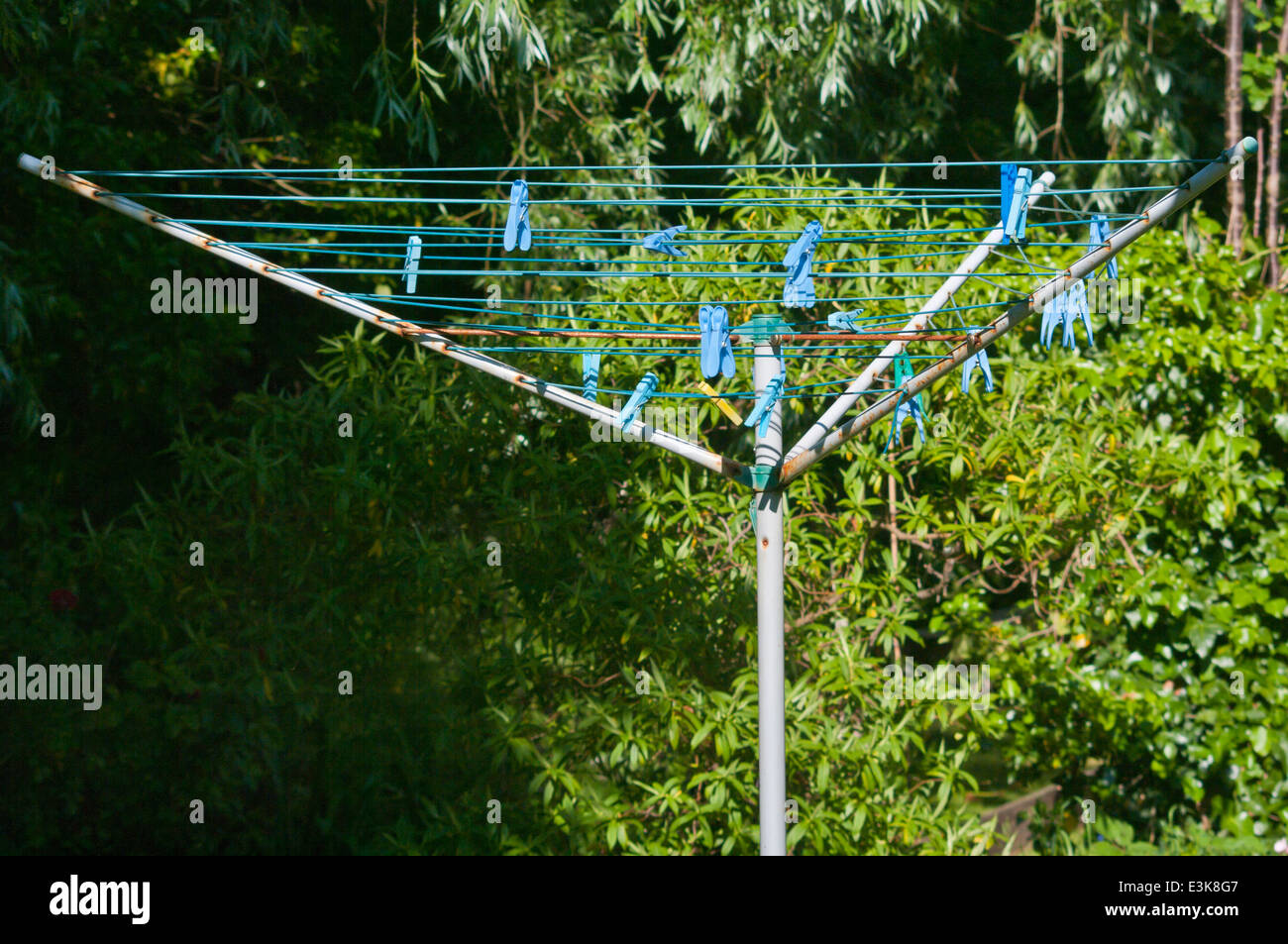Empty Rotary Clothes Line With Pegs On Stock Photo - Alamy