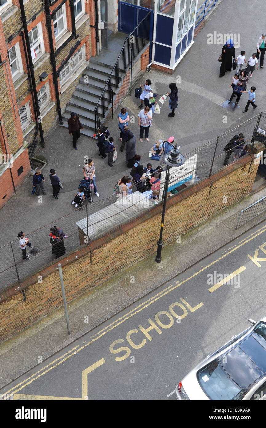 Children arriving at primary school after summer holiday. Stock Photo