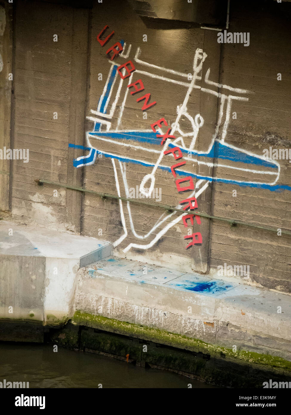 Graffiti 'urban explorer' Stock Photo - Alamy