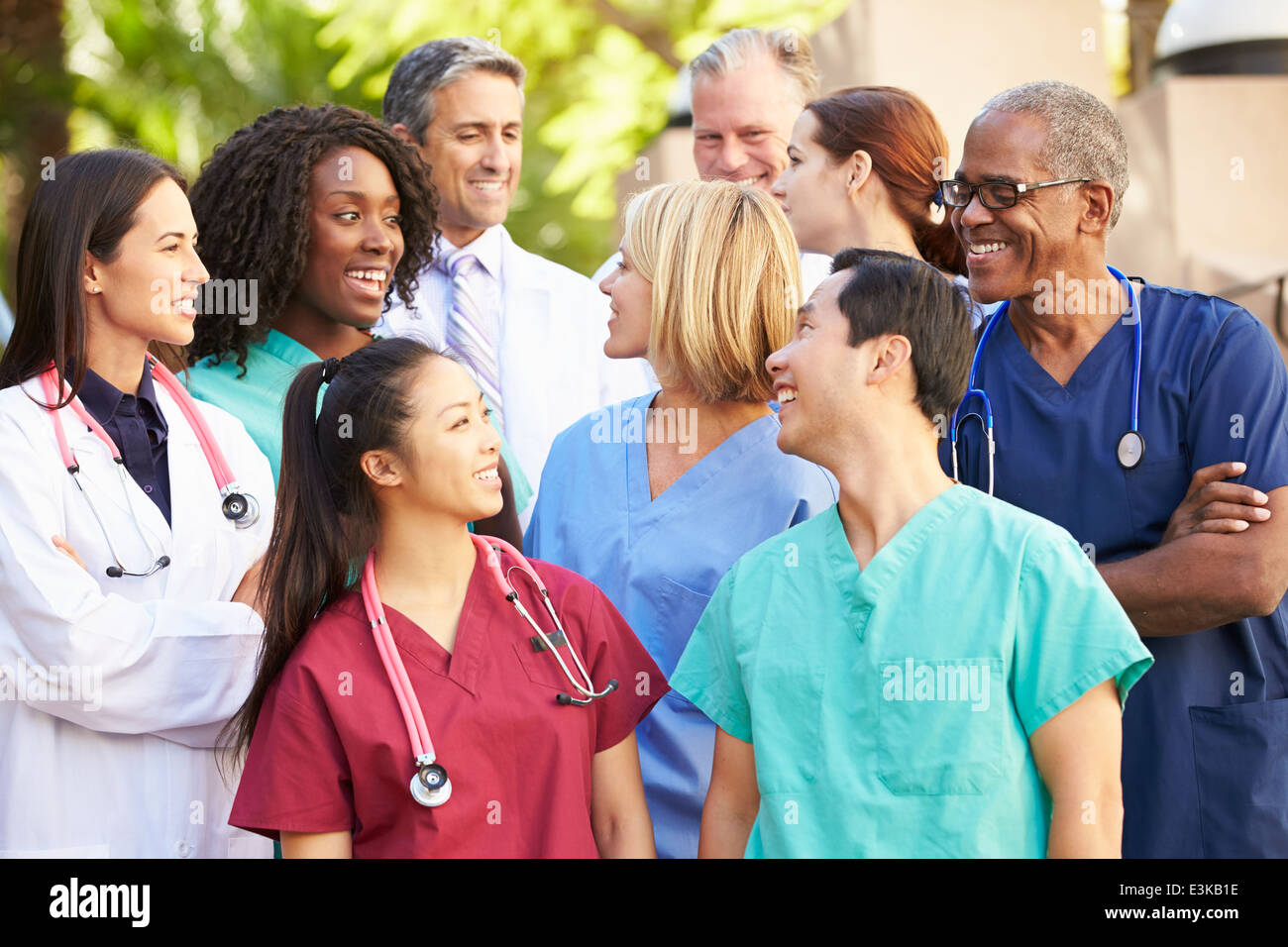 Medical Team Having Discussion Outdoors Stock Photo