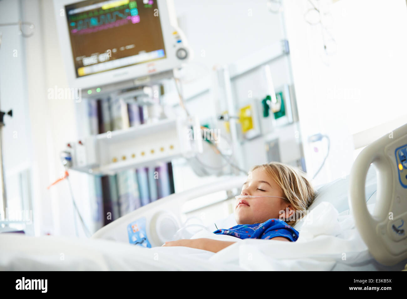 Young Girl Sleeping In Intensive Care Unit Stock Photo