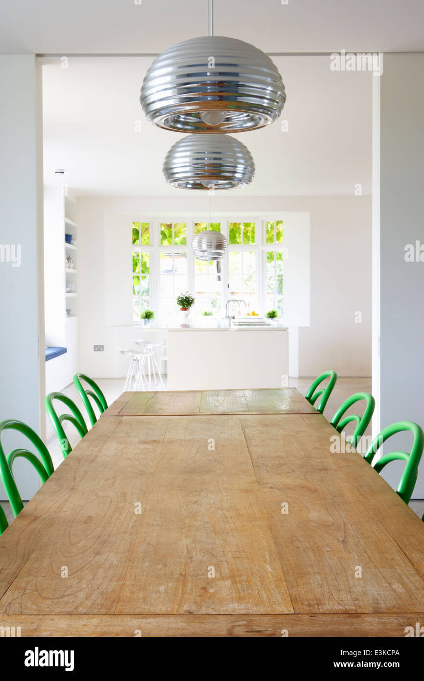 Dining Room In Modern House With Table And Chairs Stock Photo
