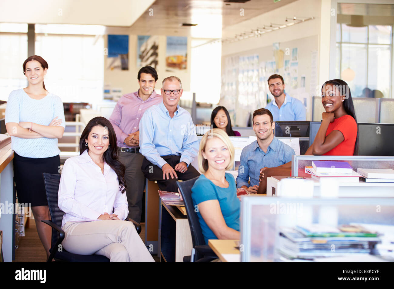 Portrait Of Businesspeople In Modern Open Plan Office Stock Photo - Alamy