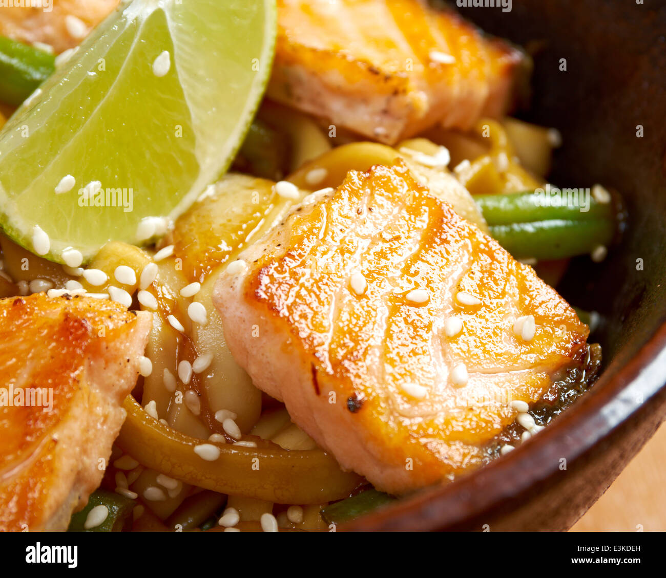 Japanese Cuisine - Udon (thick wheat noodles) with Salmon and Vegetables Stock Photo