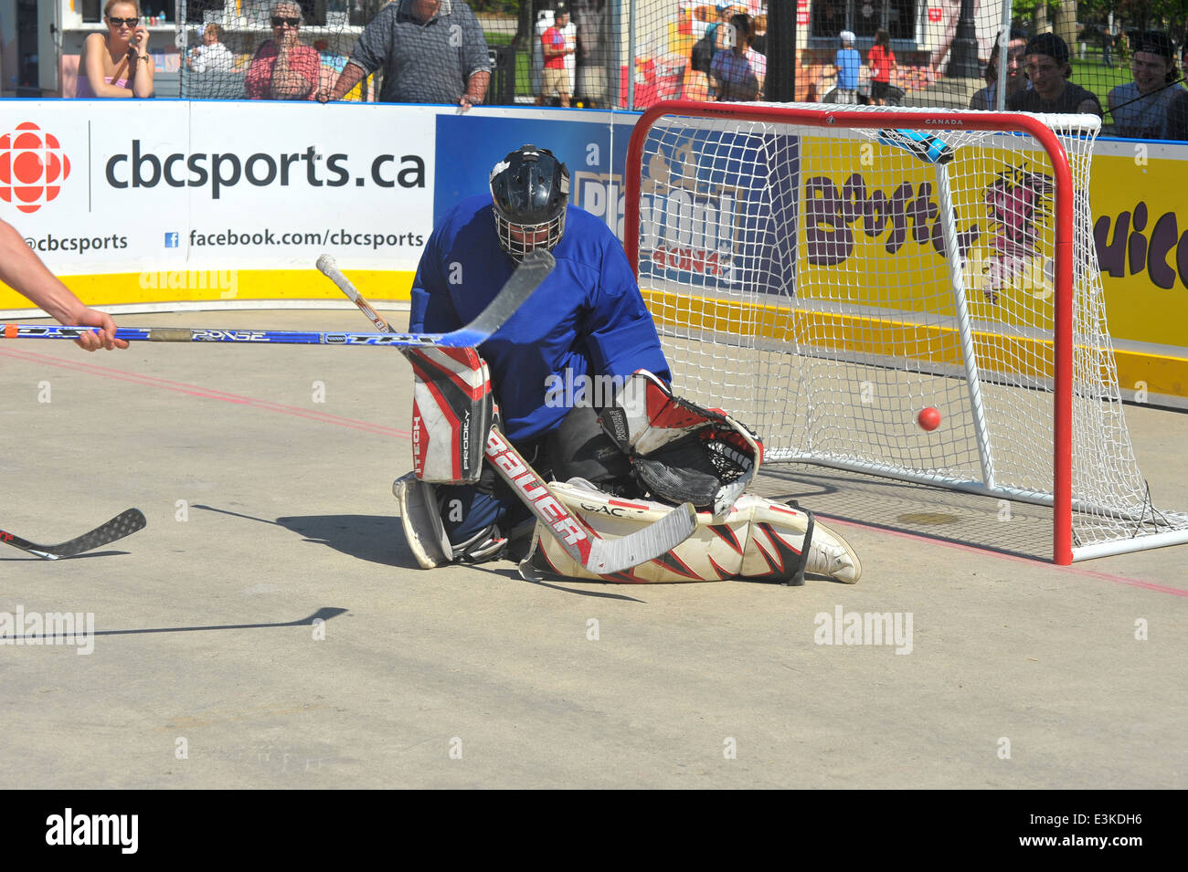 Roller Hockey Goalie makes a save Stock Photo - Alamy