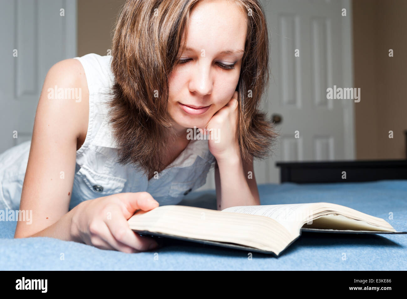 Student girl reading a book Stock Photo