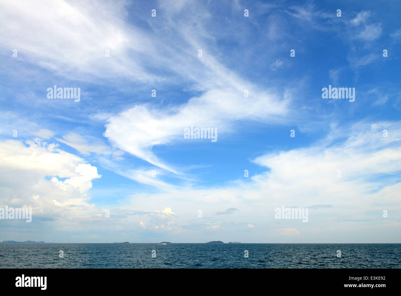 Blue sky with white clouds and sea Stock Photo - Alamy