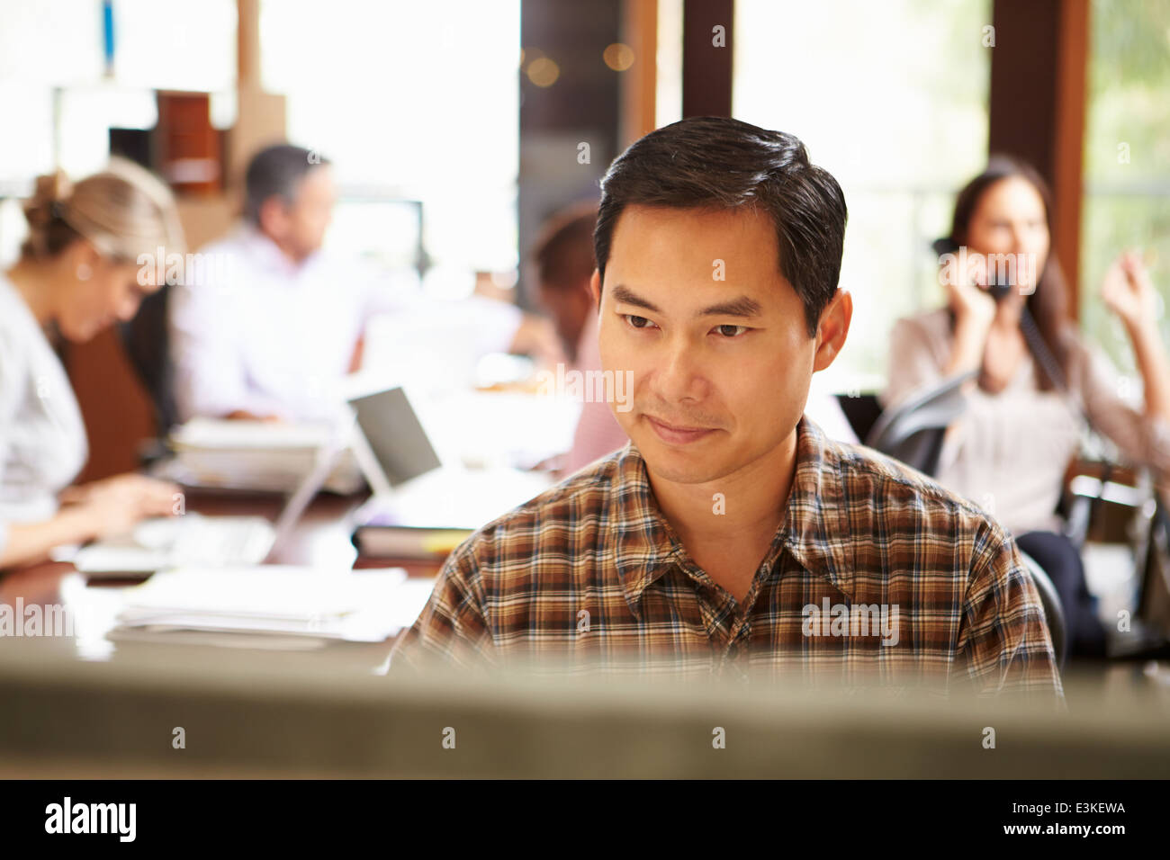 Casual businessman working desk hi-res stock photography and images - Alamy