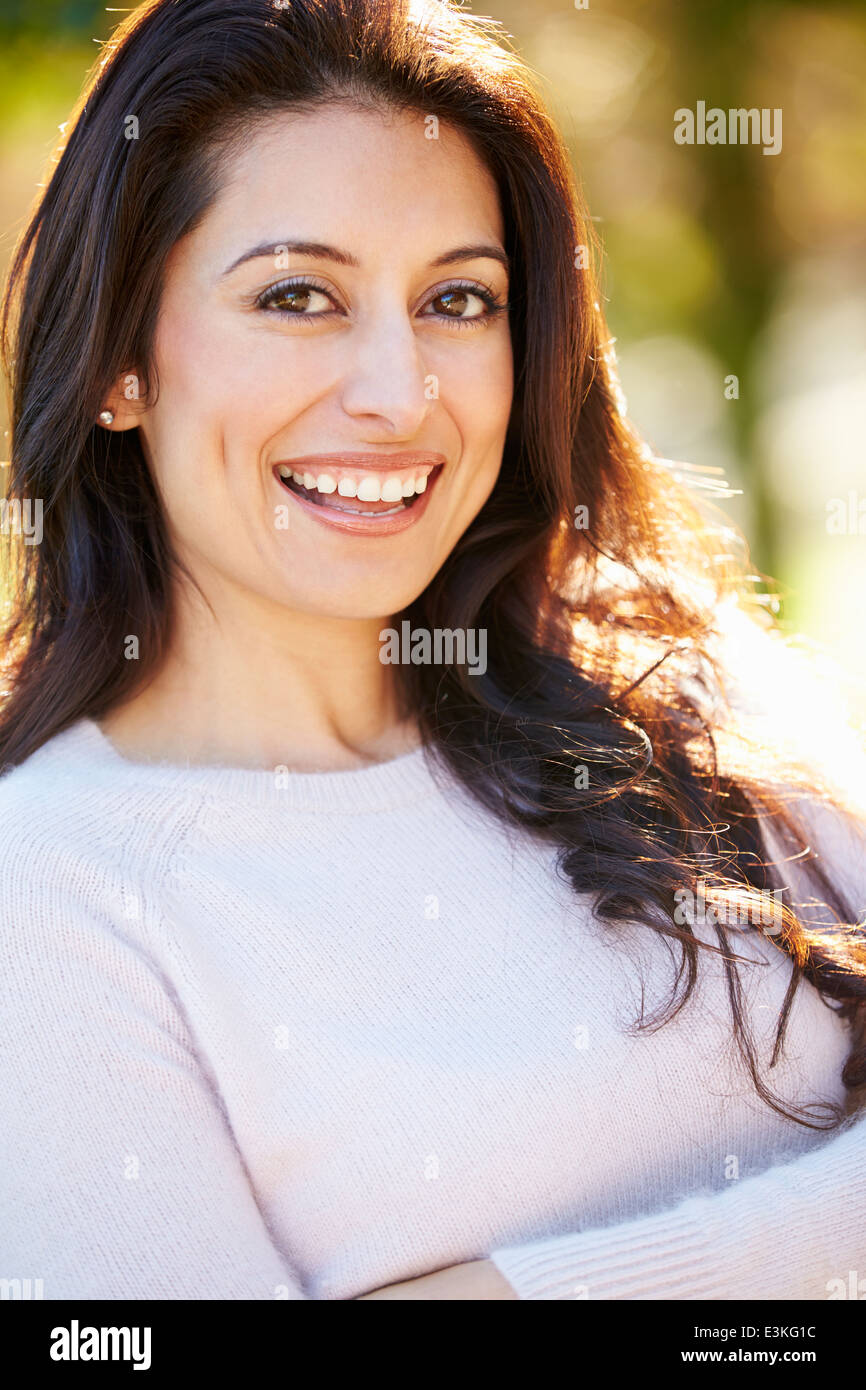Portrait Of Attractive Hispanic Woman In Countryside Stock Photo
