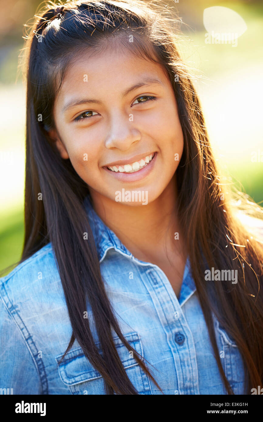 Portrait Of Hispanic Girl In Countryside Stock Photo