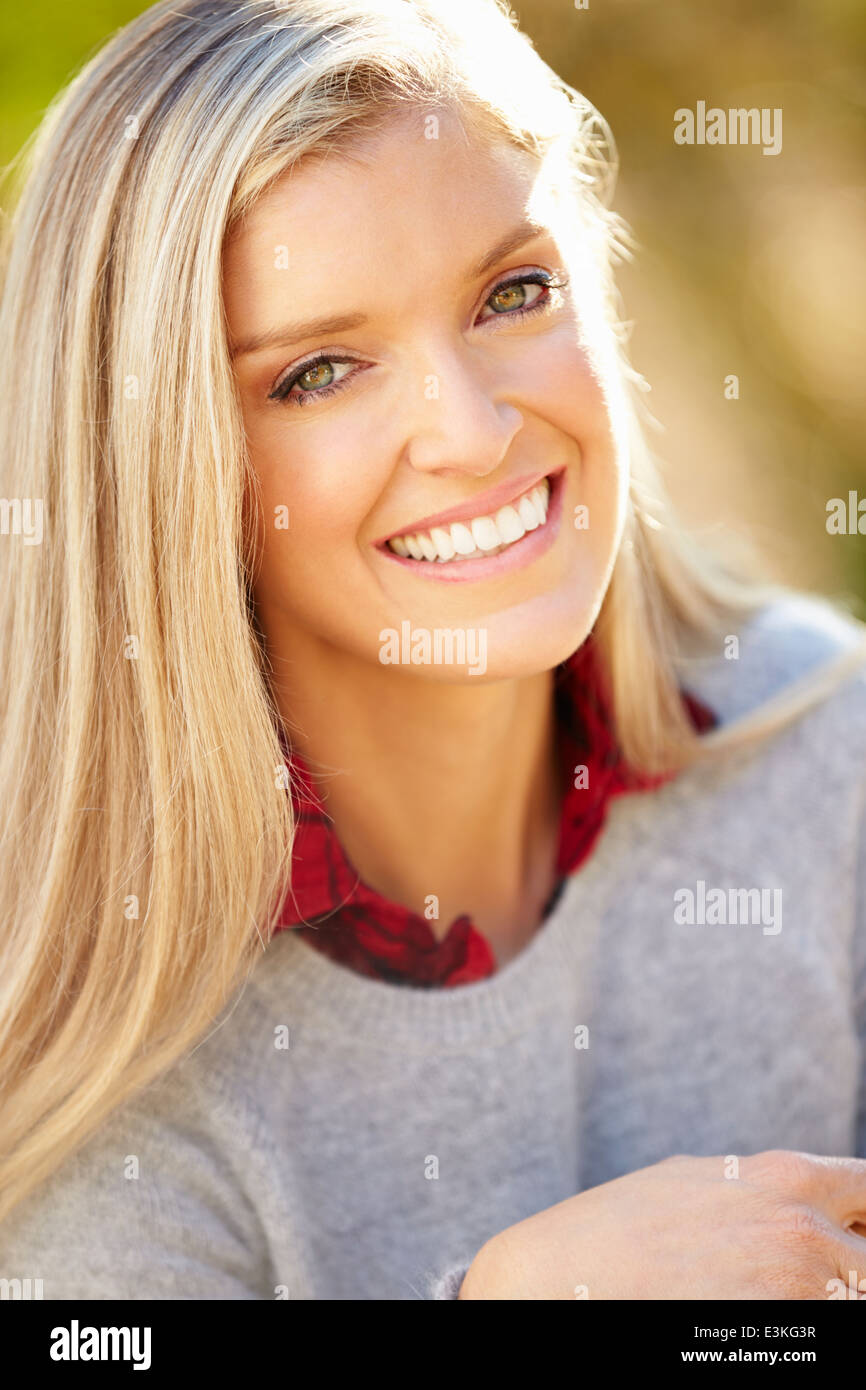 Portrait Of Attractive Woman In Countryside Stock Photo