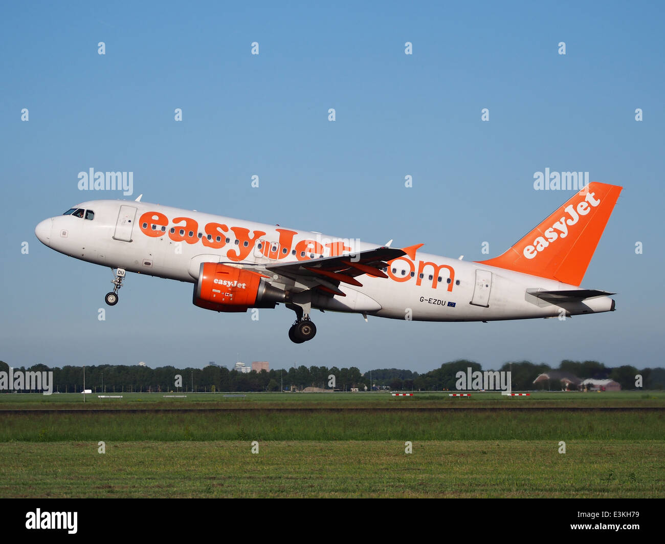 The easyJet Airbus A319-111, registration G-EZDU, is captured during ...