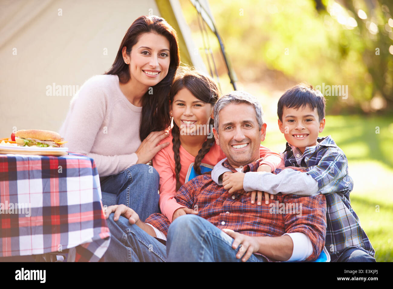 Family Enjoying Camping Holiday In Countryside Stock Photo - Alamy