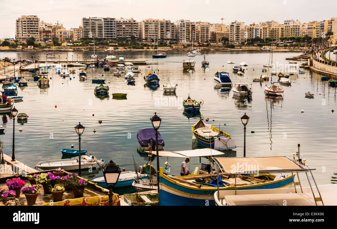 Spinola Bay harbour early morning Stock Photo