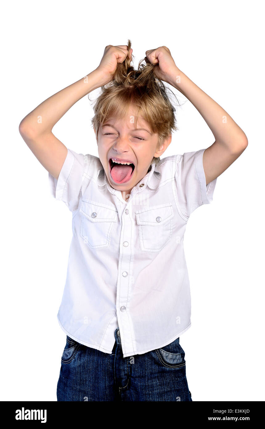 aggressive anger angry annoyed background boy brash child closeup crazy defiant distorted desperate emotion expression face faci Stock Photo
