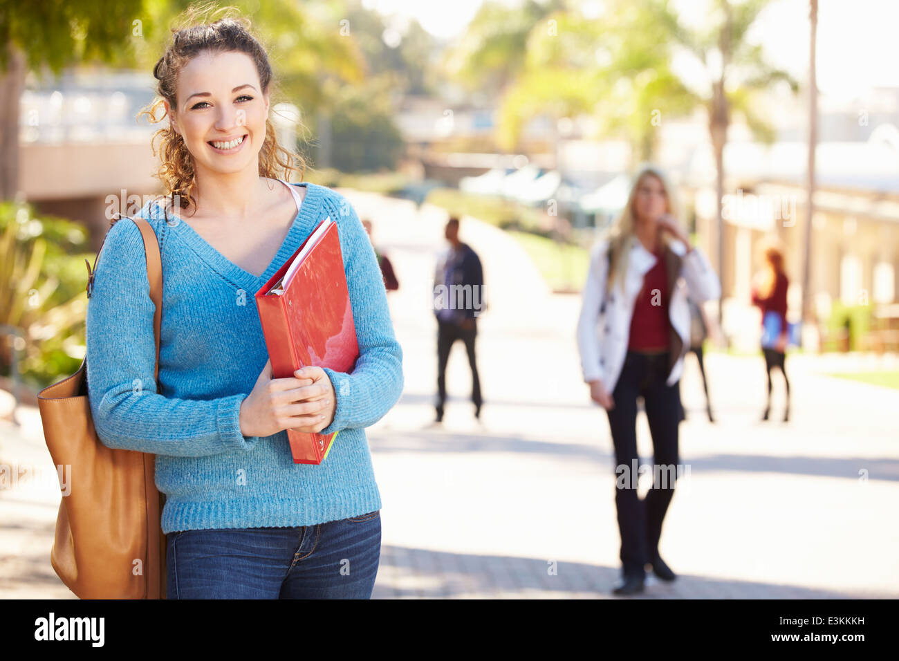 Portrait Of Female University Student Outdoors On Campus Stock Photo