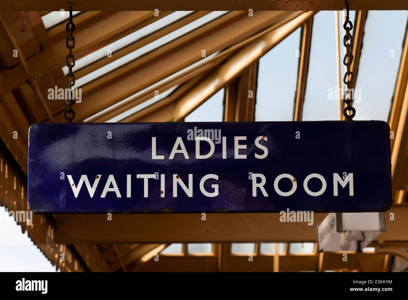 A 'ladies waiting room' sign at a railway station Stock Photo