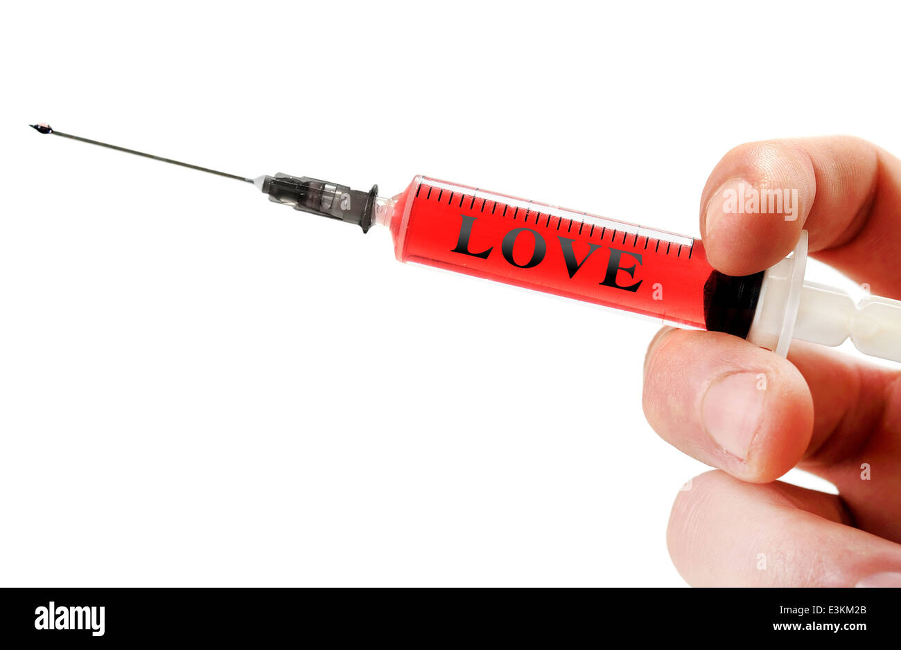 Love word on red syringe Stock Photo Alamy