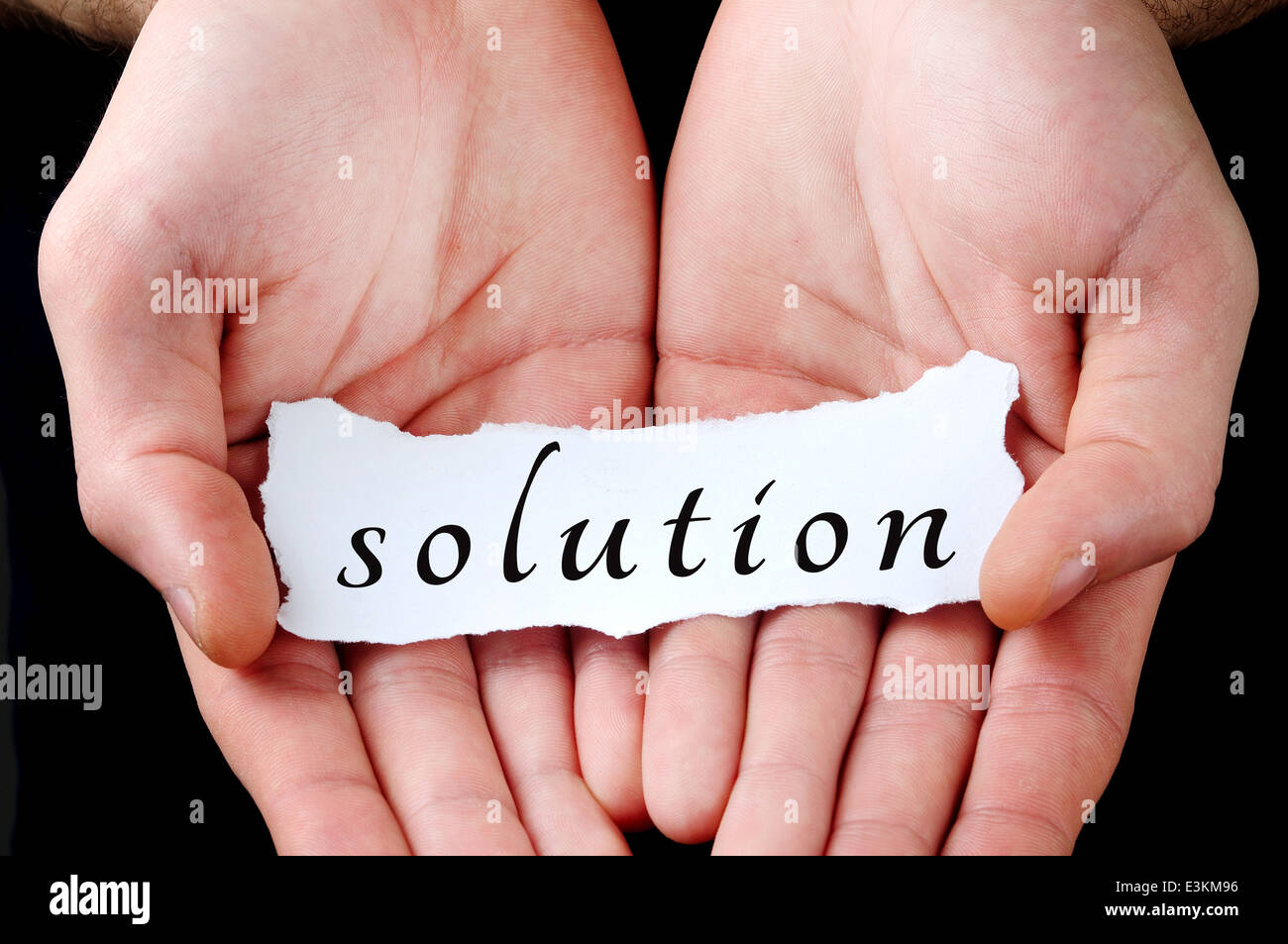 Man holding solution word in palm Stock Photo Alamy