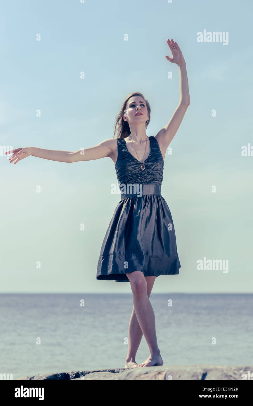 Young woman cute dancing pose hi-res stock photography and images - Alamy
