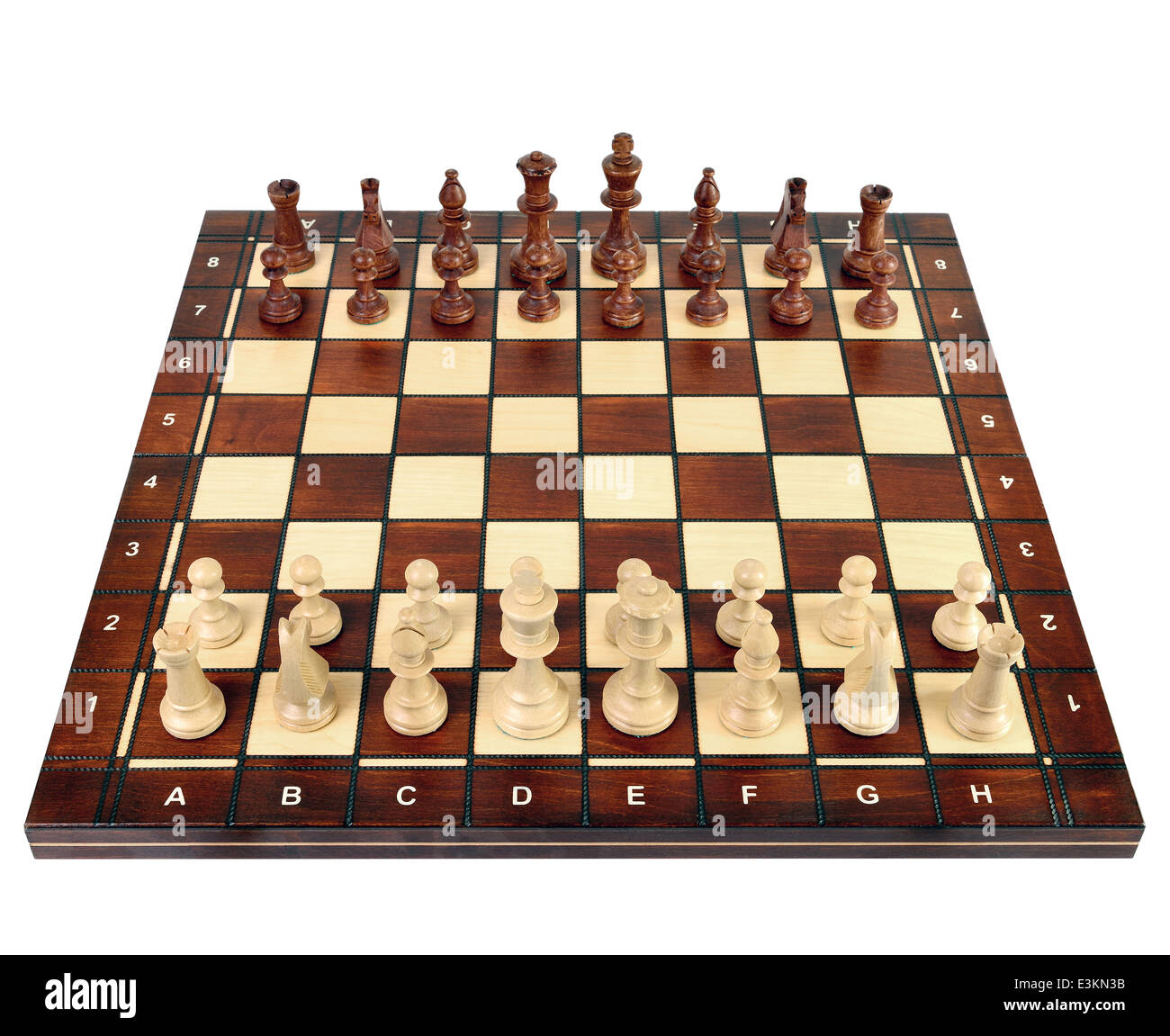 Wooden chess board with chess pieces on isolated on a white background Stock Photo