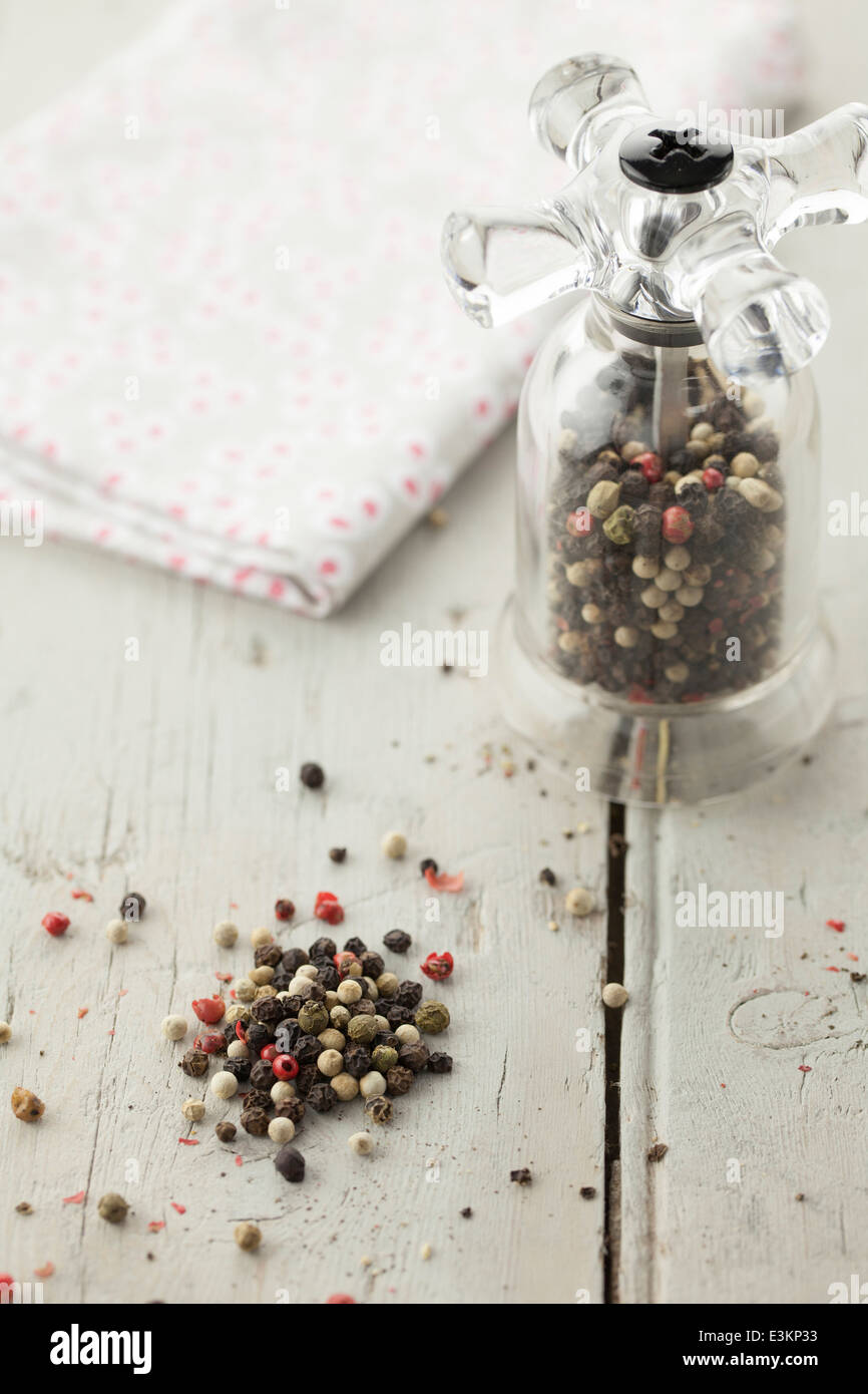 Mixed Peppercorns in Pepper Mill Stock Photo