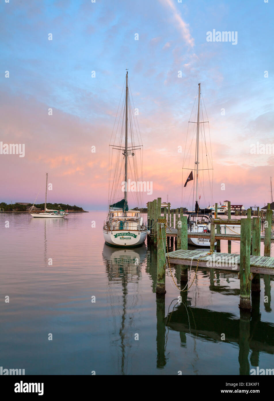 Ocracoke Island, Outer Banks, NC Colors of sunrise above the boats of
