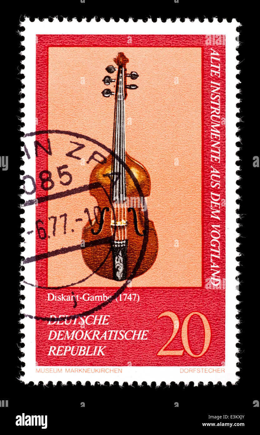 Postage stamp from East Germany (DDR) depicting a violin from Germany, in the Markneukirchen Music Museum. Stock Photo
