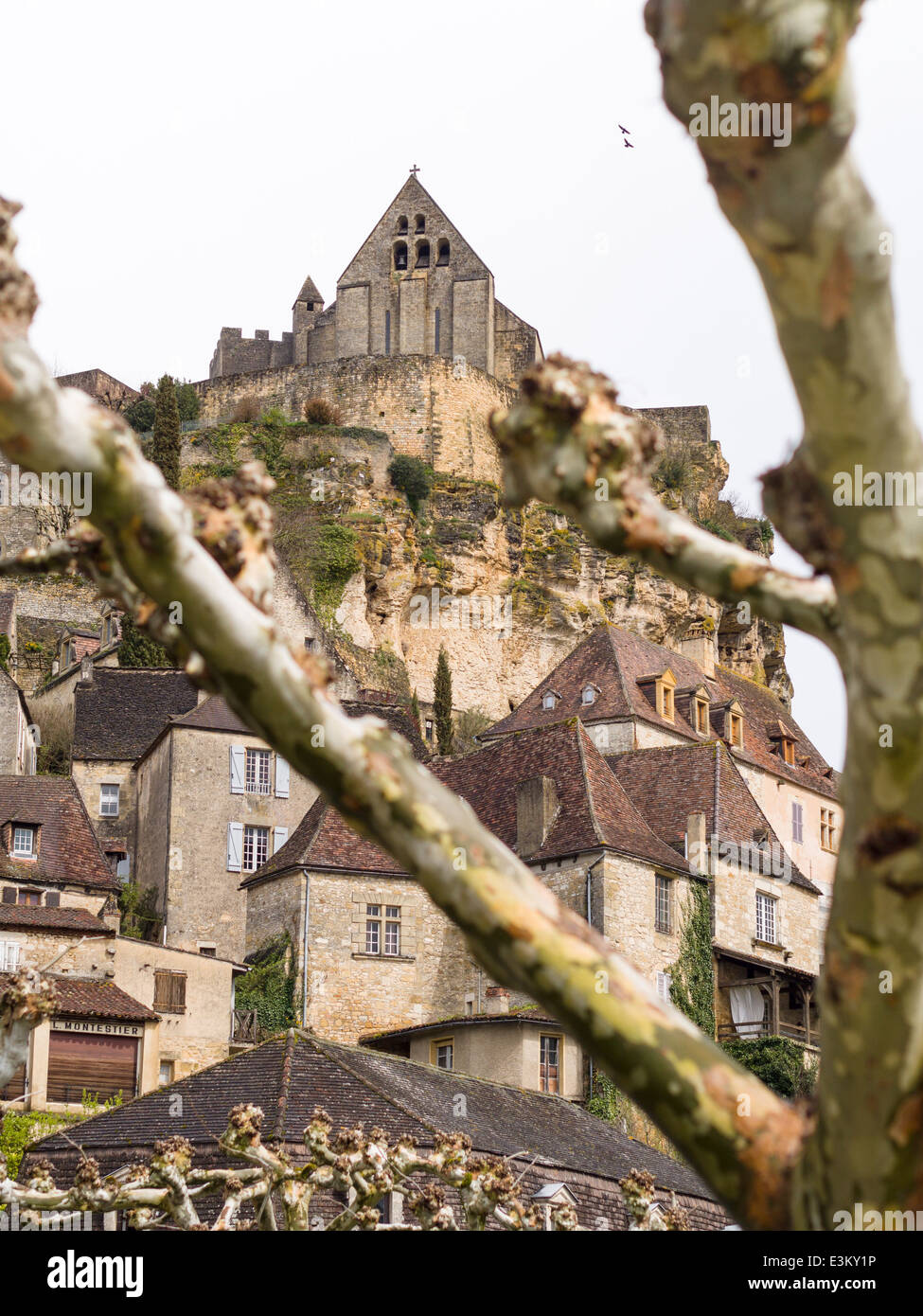 Romanesque Chapel above Beynac-et-Cazenac. Perched high above the village is this old Romanesque church. Stock Photo