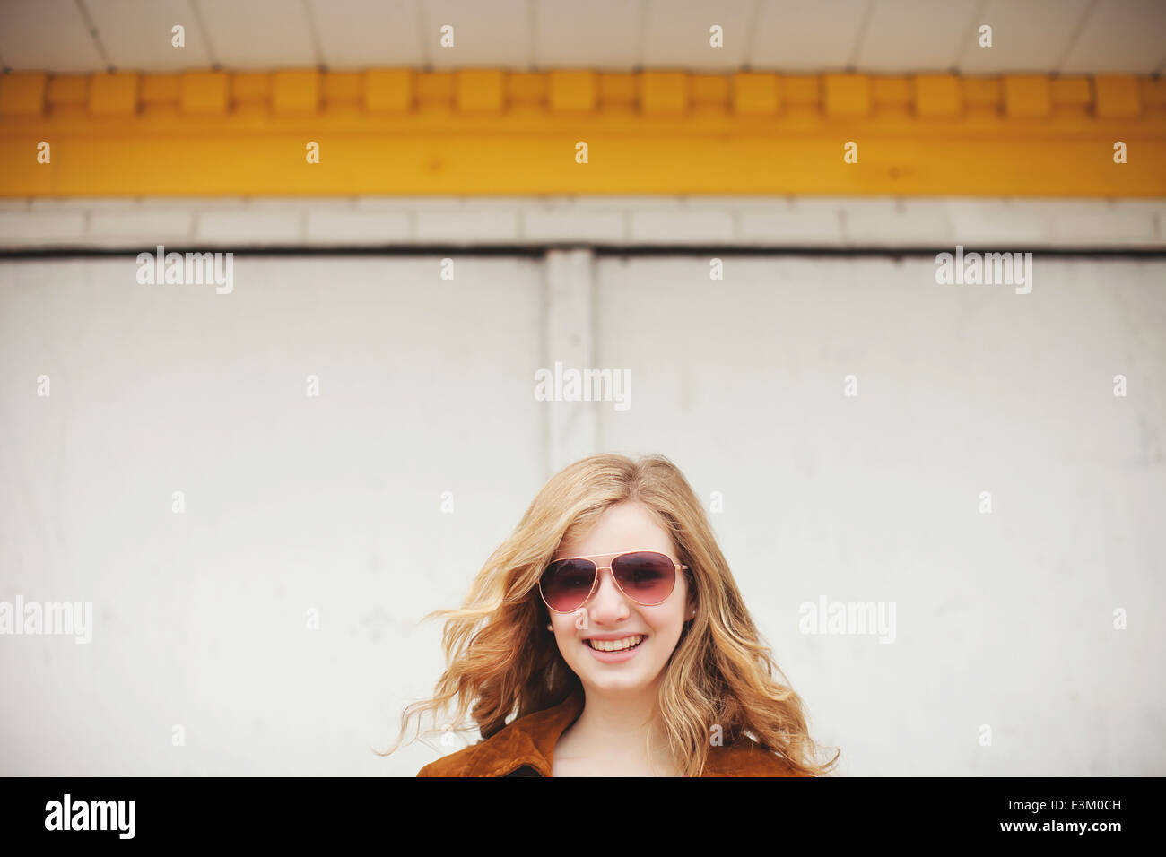 Portrait of teenage girl (13-15) with sunglasses, New Hampshire, USA Stock Photo