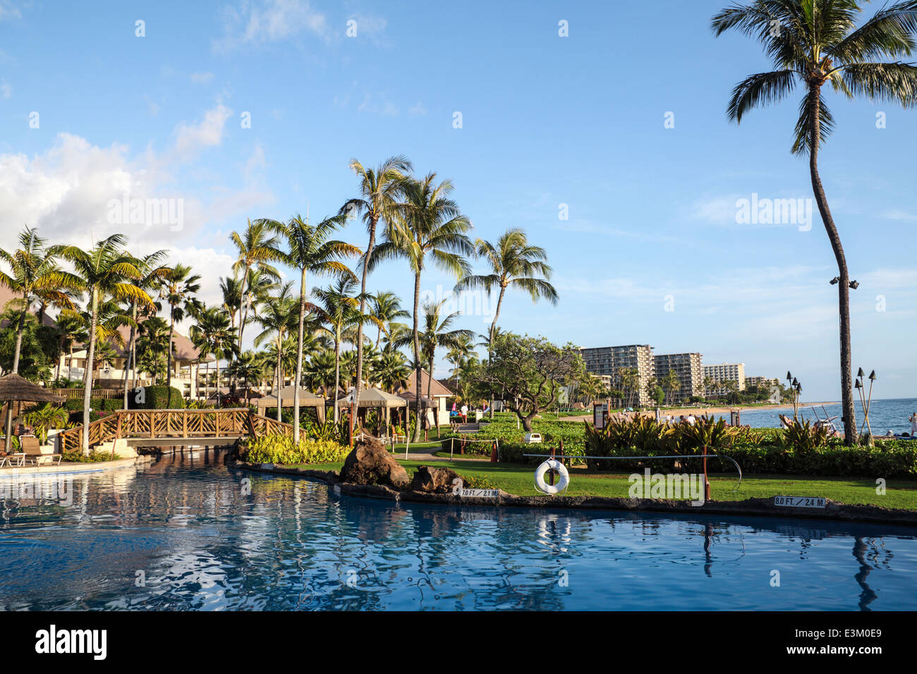 Pool at the Sheraton Maui Resort and Spa, with Kaanapali Beach in background Stock Photo