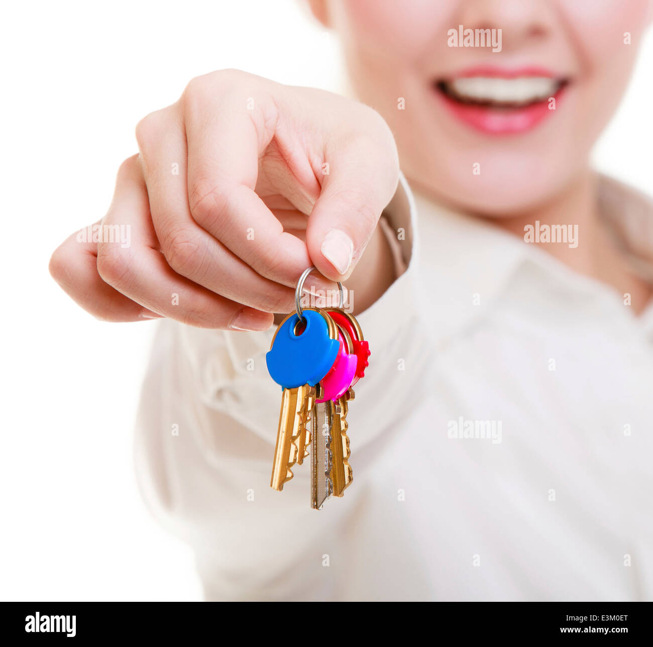woman real estate agent holding set of keys to new house Stock Photo ...