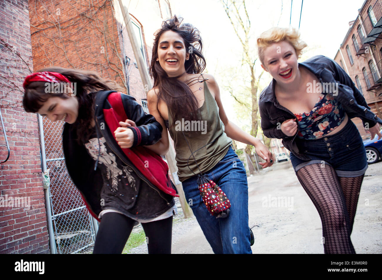 Three friends running, Massachusetts, USA Stock Photo