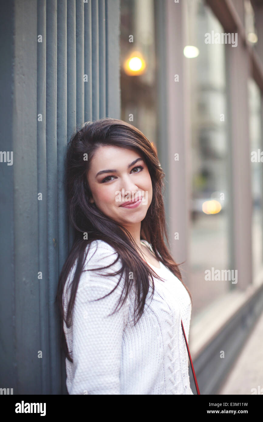 Portrait of young woman (18-19) smiling Stock Photo