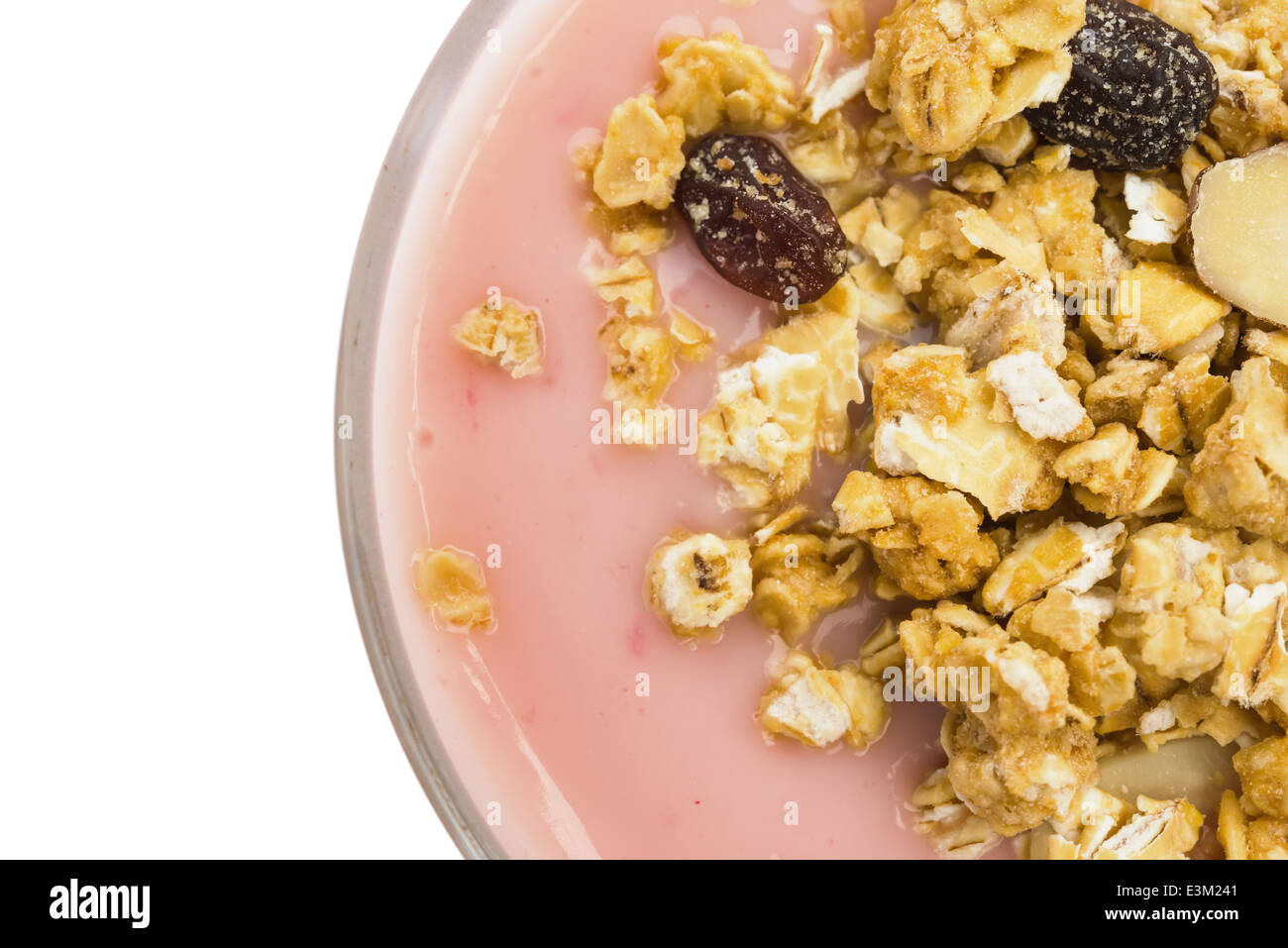 top view wholegrain muesli on top of strawberry flavor yogurt with clipping path Stock Photo