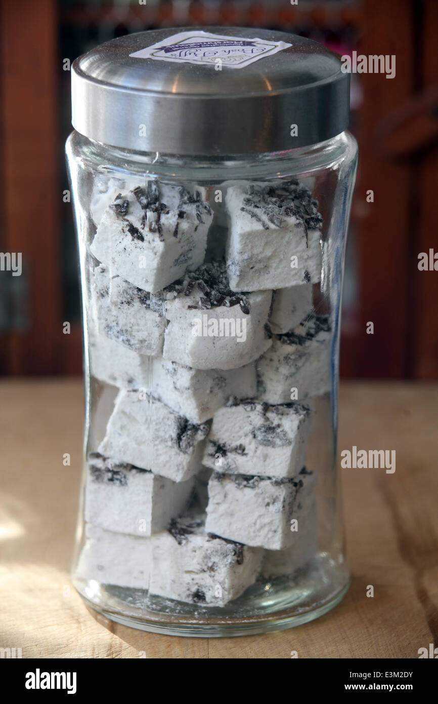 A glass jar full of marshmallow Stock Photo Alamy