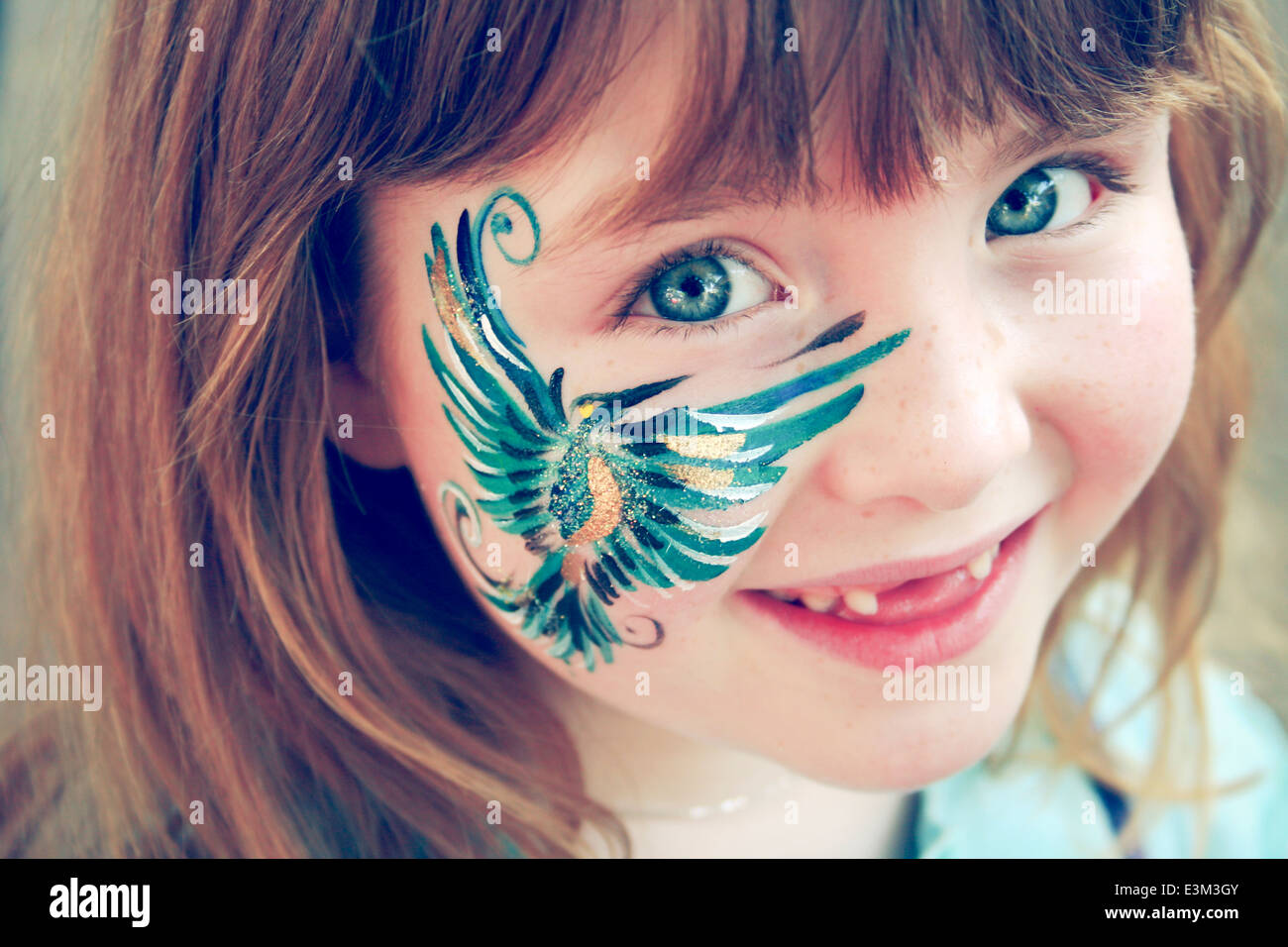 Portrait of girl (8-9) with face paint Stock Photo