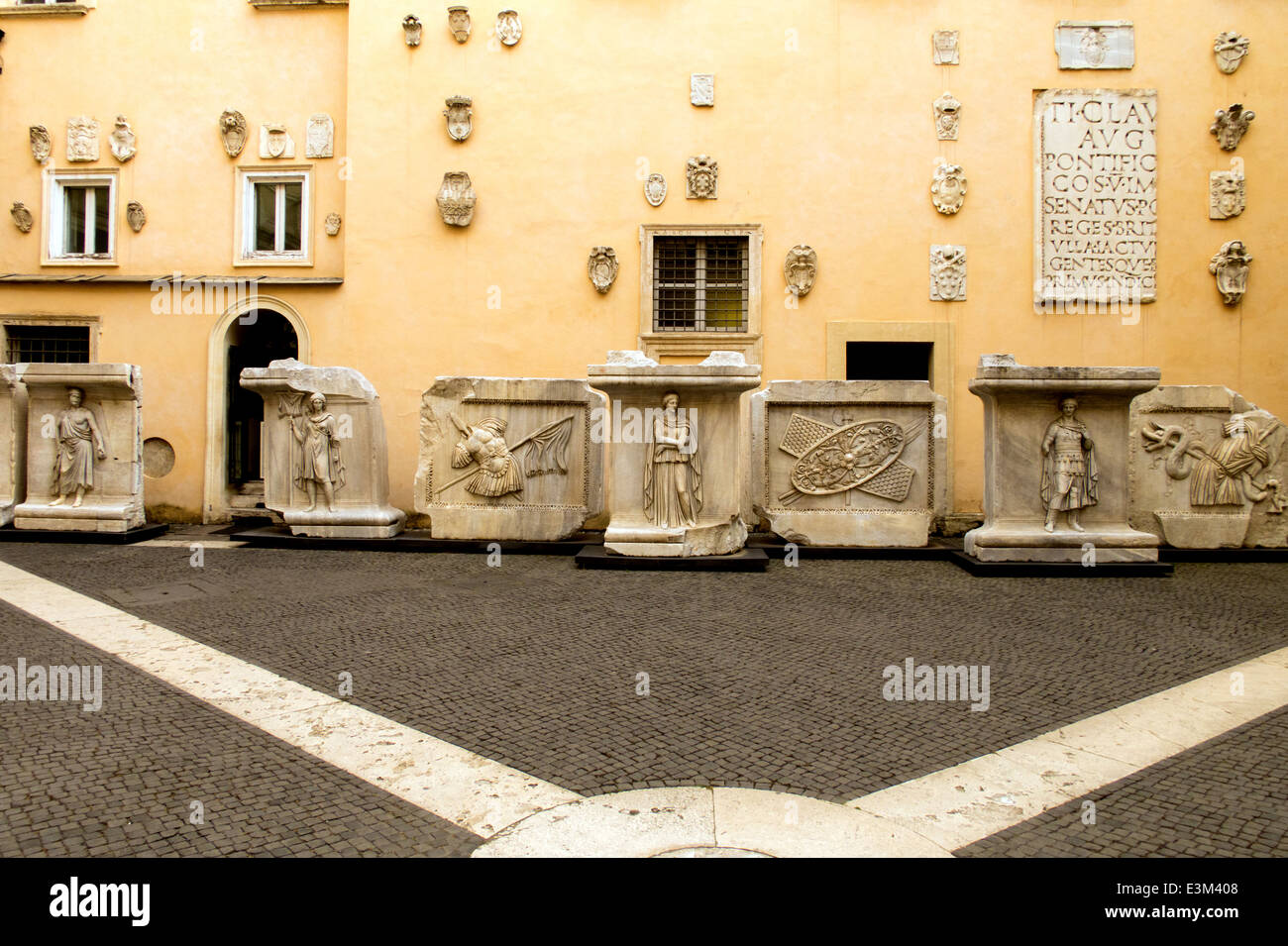 Various ancient pieces of sculpture standing in the Capitoline Museum courtyard in Rome Stock Photo
