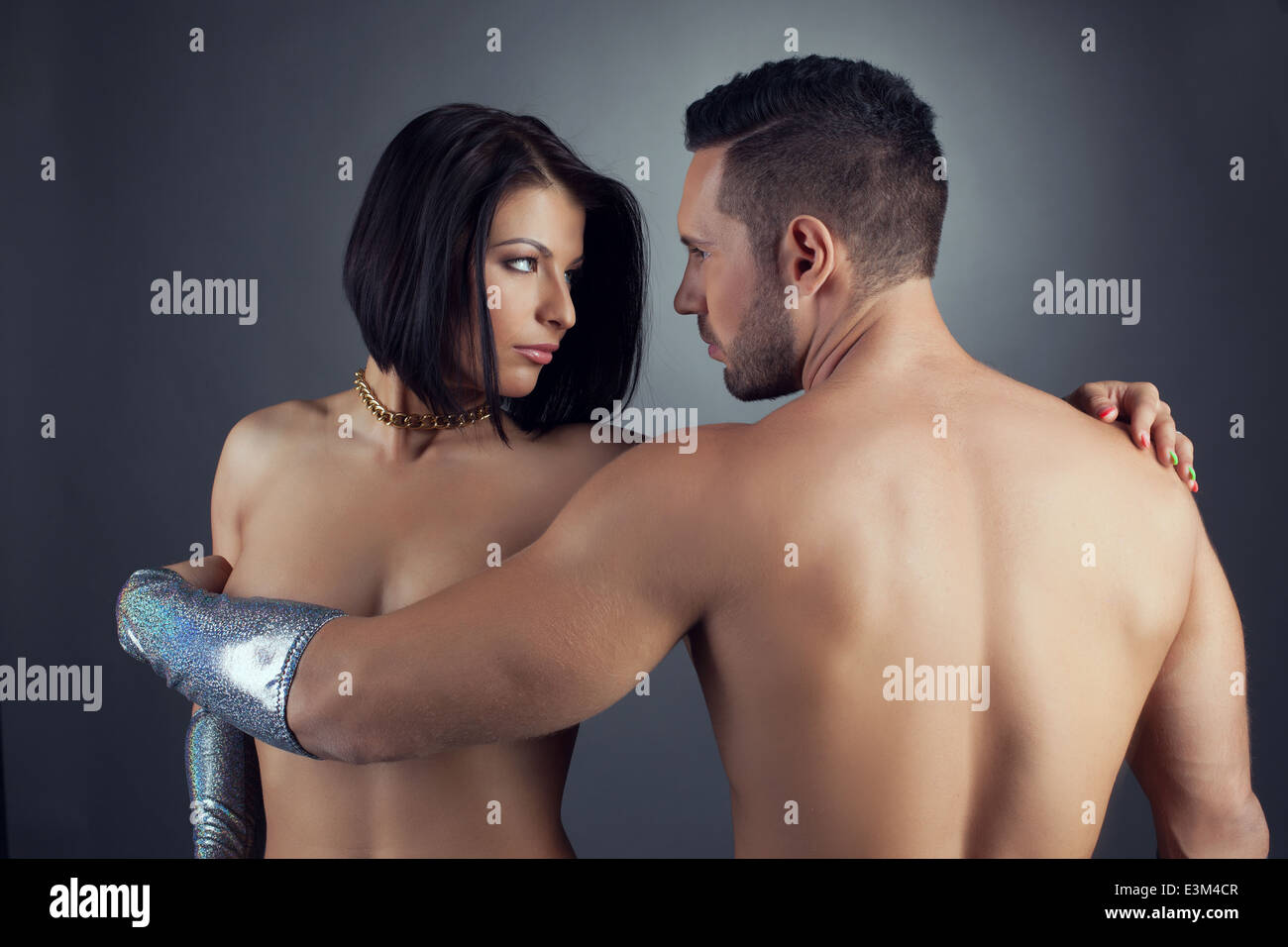 Image of naked young lovers looking at each other Stock Photo - Alamy